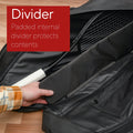 A hand placing a tennis racket inside the Tennis Travel Bundle by Cancha featuring a padded internal divider, with text reading "Divider: Padded internal divider protects contents. Ideal travel accessory for athletes on the go.